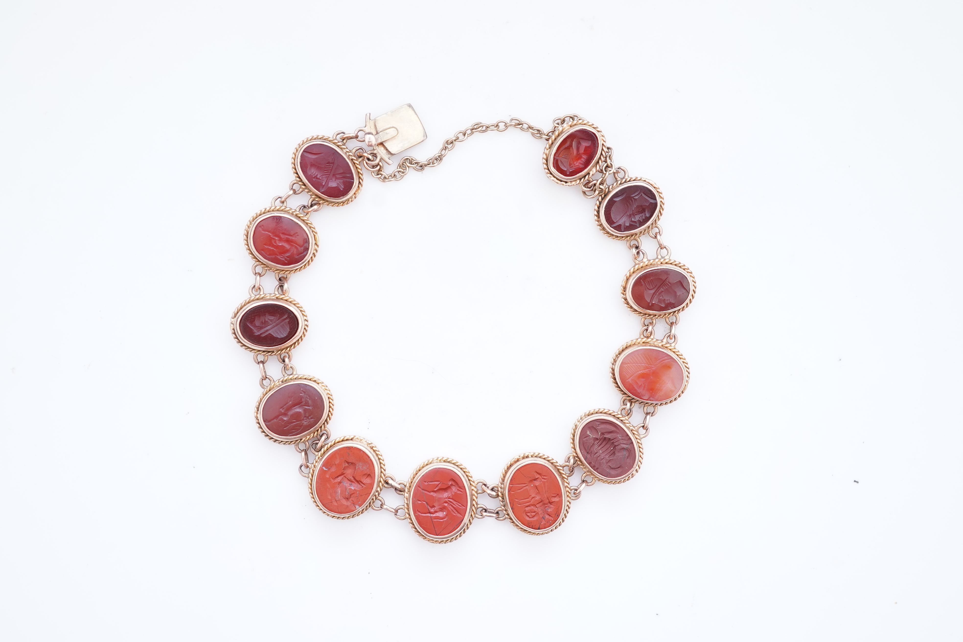 A carnelian and jasper intaglio bracelet, late 19th/early 20th century